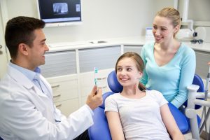 parent and child at the dentist's office