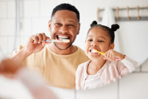 brushing teeth family